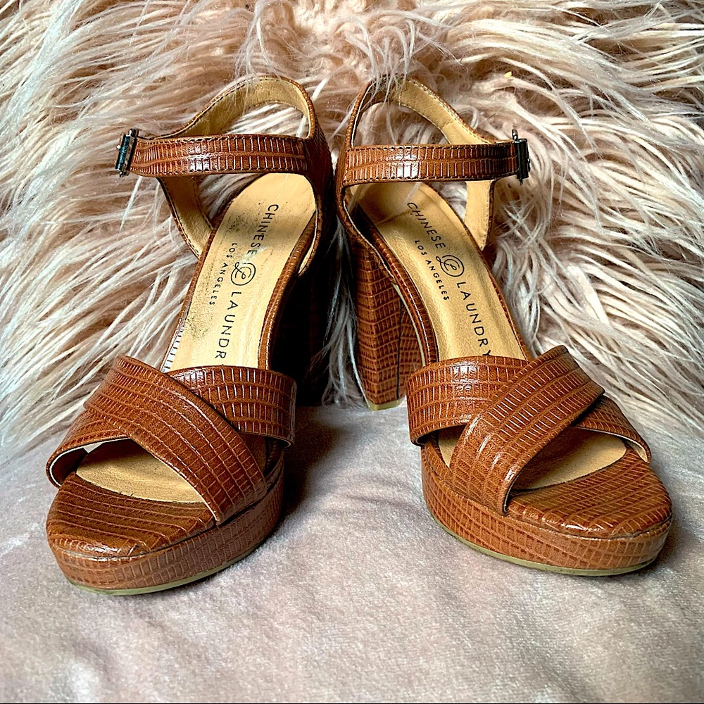 Very cute 4 inch heels! Light brown with straps size 6 .only used once!